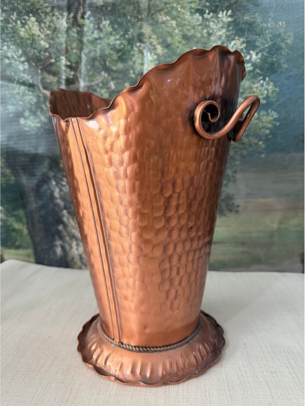 Hammered copper vase with scroll handles